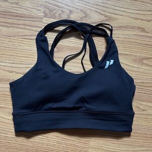 Strappy Black Sports Bra with Minimal Logo